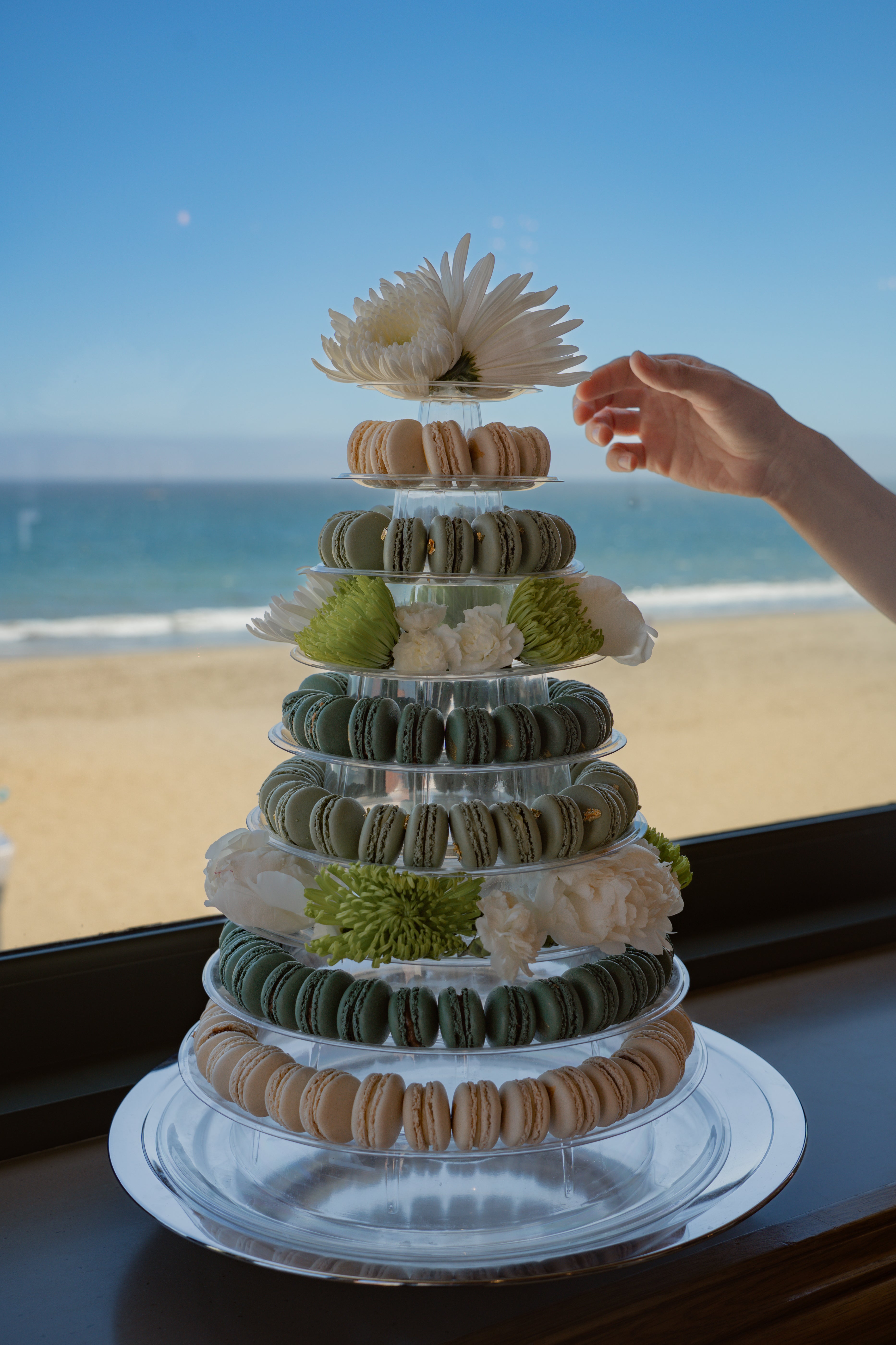 a gorgeous french macaron tower for a santa barbara beach wedding