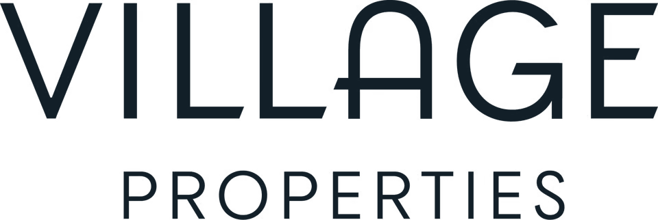 Village Properties logo in dark navy text on a white background.